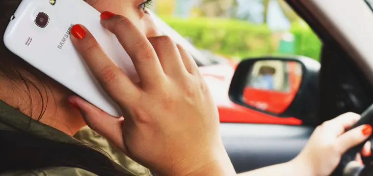 person-woman-smartphone-car Woman on phone