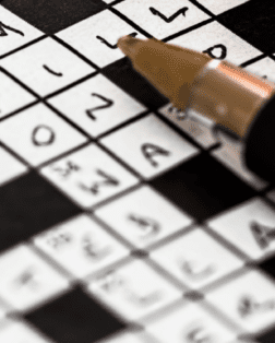 Crossword and pen