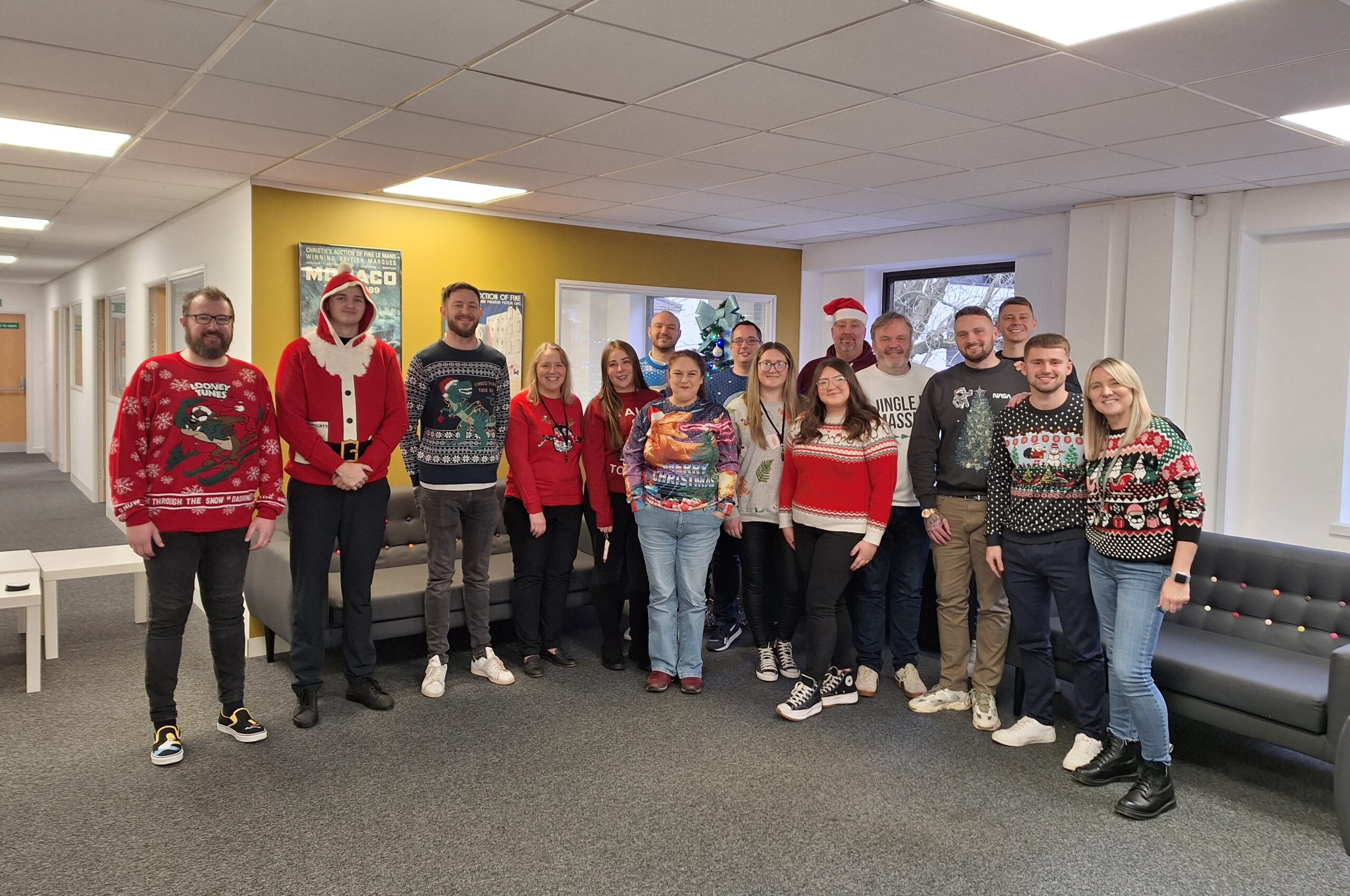 Tradesure Insurance employees wearing Christmas jumpers for the Save the Children Charity Day in December 2023